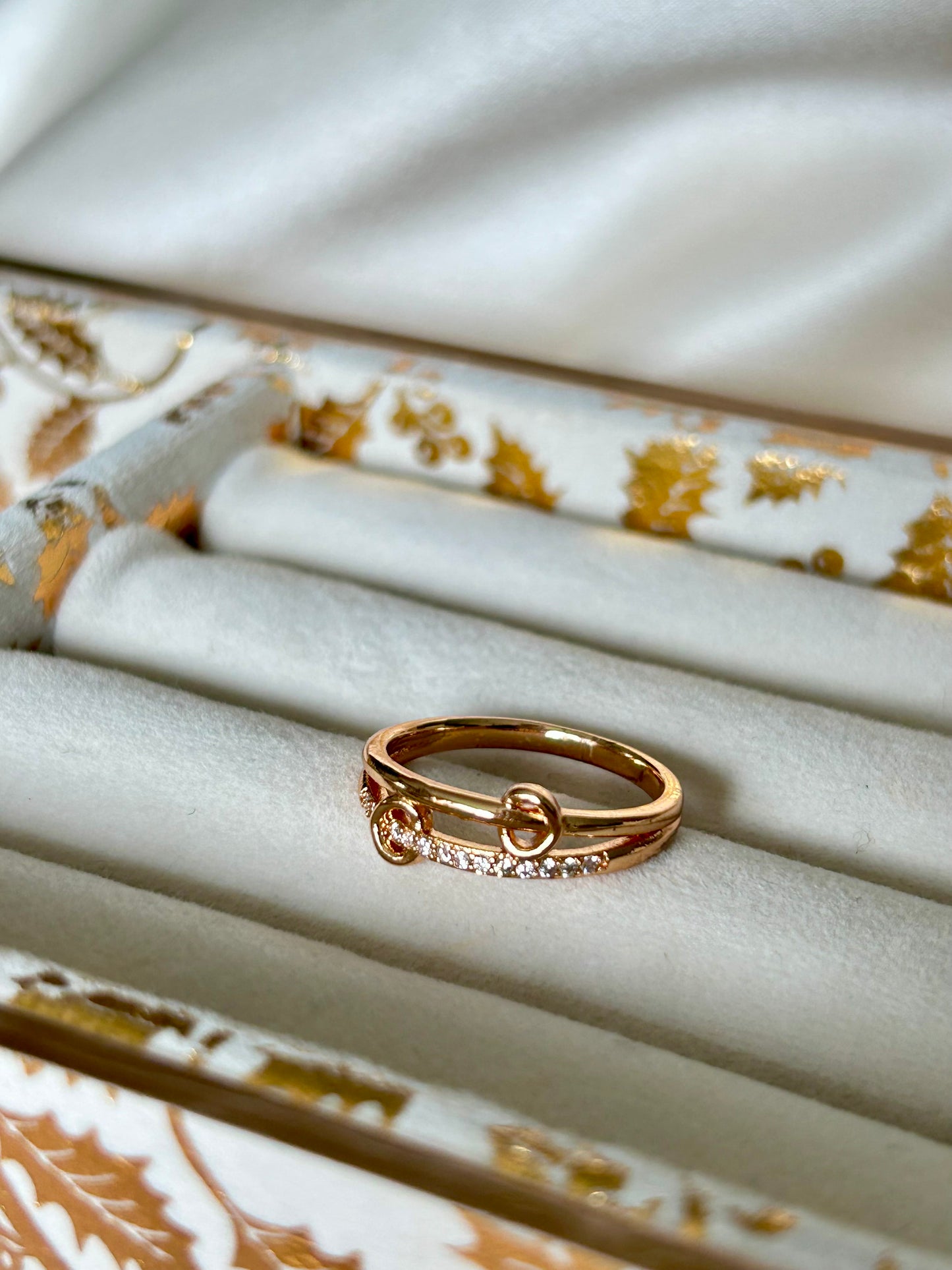 Rose gold toned ring